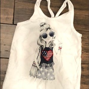 A white girls tank top with a patriotic girl on it
